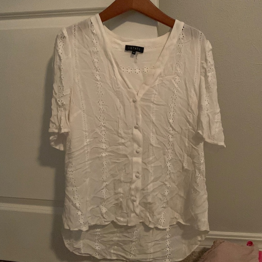 White eyelet short sleeved shirt. Size medium